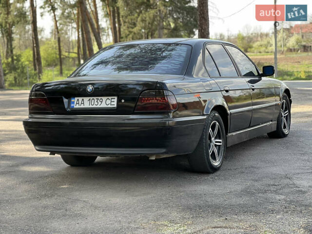 Чорний БМВ 7 Серія, об'ємом двигуна 4.4 л та пробігом 400 тис. км за 3850 $, фото 7 на Automoto.ua
