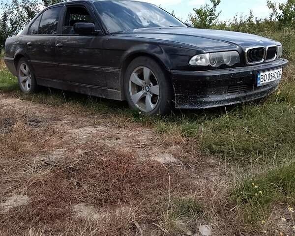 Черный БМВ 7 Серия, объемом двигателя 3 л и пробегом 300 тыс. км за 5000 $, фото 5 на Automoto.ua