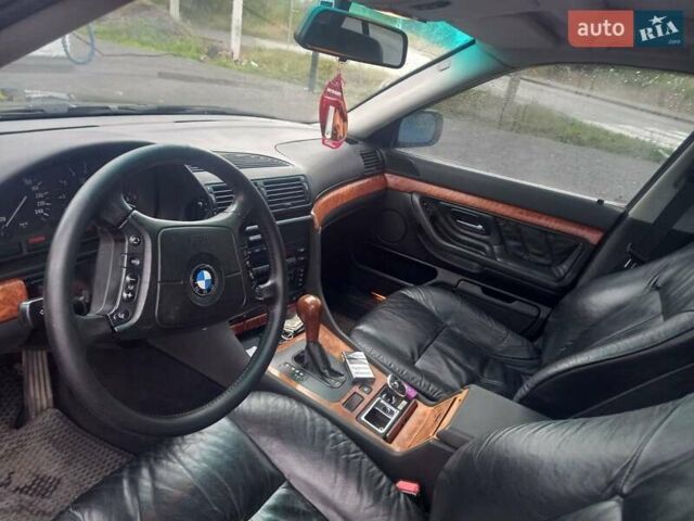 Черный БМВ 7 Серия, объемом двигателя 2.8 л и пробегом 300 тыс. км за 7500 $, фото 2 на Automoto.ua