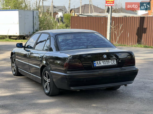 Чорний БМВ 7 Серія, об'ємом двигуна 4.4 л та пробігом 400 тис. км за 3850 $, фото 12 на Automoto.ua