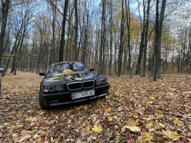 Черный БМВ 7 Серия, объемом двигателя 2.5 л и пробегом 300 тыс. км за 3550 $, фото 1 на Automoto.ua