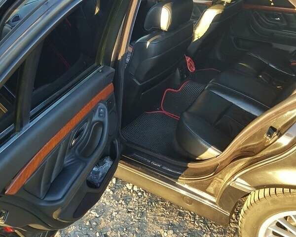 Черный БМВ 7 Серия, объемом двигателя 3.5 л и пробегом 400 тыс. км за 4200 $, фото 7 на Automoto.ua