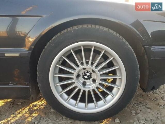 Черный БМВ 7 Серия, объемом двигателя 3.5 л и пробегом 400 тыс. км за 4200 $, фото 19 на Automoto.ua