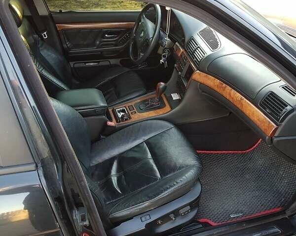 Черный БМВ 7 Серия, объемом двигателя 3.5 л и пробегом 400 тыс. км за 4200 $, фото 13 на Automoto.ua