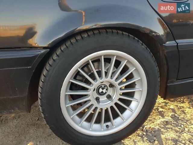 Черный БМВ 7 Серия, объемом двигателя 3.5 л и пробегом 400 тыс. км за 4200 $, фото 18 на Automoto.ua