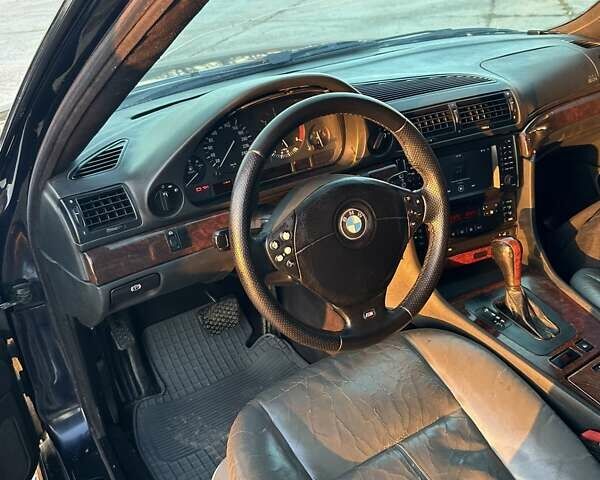 Черный БМВ 7 Серия, объемом двигателя 3 л и пробегом 310 тыс. км за 5000 $, фото 14 на Automoto.ua