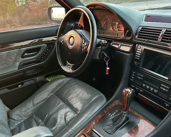 Черный БМВ 7 Серия, объемом двигателя 3 л и пробегом 310 тыс. км за 5000 $, фото 13 на Automoto.ua