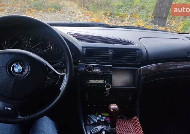 Черный БМВ 7 Серия, объемом двигателя 5.4 л и пробегом 270 тыс. км за 3000 $, фото 1 на Automoto.ua