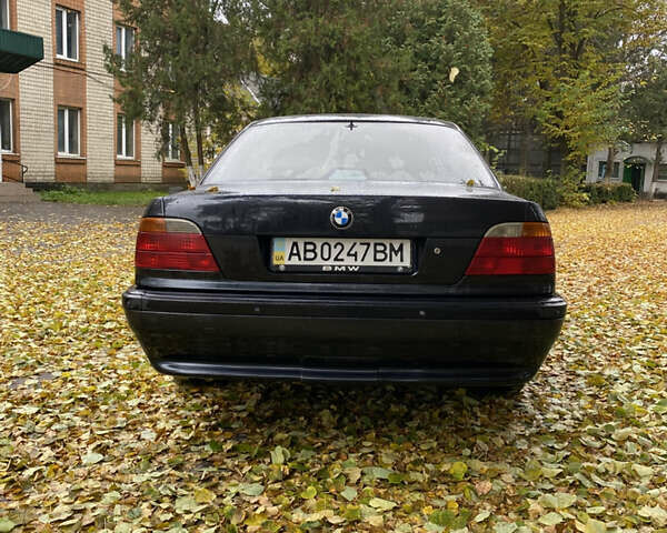 Черный БМВ 7 Серия, объемом двигателя 2.5 л и пробегом 300 тыс. км за 4550 $, фото 4 на Automoto.ua