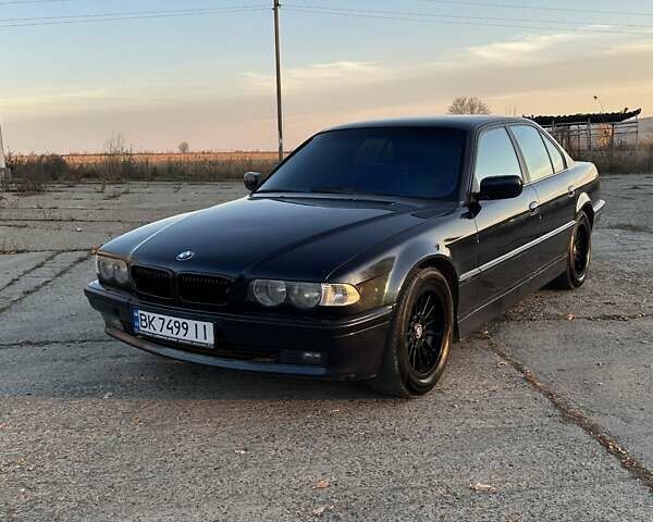 Черный БМВ 7 Серия, объемом двигателя 3 л и пробегом 310 тыс. км за 5000 $, фото 1 на Automoto.ua