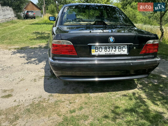 Черный БМВ 7 Серия, объемом двигателя 4.4 л и пробегом 130 тыс. км за 10000 $, фото 3 на Automoto.ua