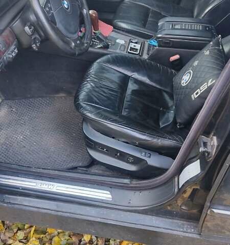 Черный БМВ 7 Серия, объемом двигателя 5.4 л и пробегом 270 тыс. км за 3000 $, фото 3 на Automoto.ua