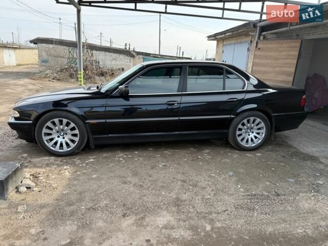 Черный БМВ 7 Серия, объемом двигателя 4.4 л и пробегом 345 тыс. км за 12000 $, фото 14 на Automoto.ua