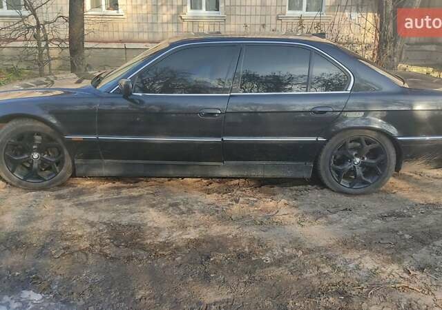 Черный БМВ 7 Серия, объемом двигателя 5.4 л и пробегом 270 тыс. км за 3000 $, фото 4 на Automoto.ua