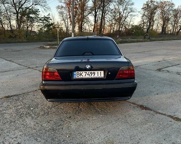 Черный БМВ 7 Серия, объемом двигателя 3 л и пробегом 310 тыс. км за 5000 $, фото 9 на Automoto.ua