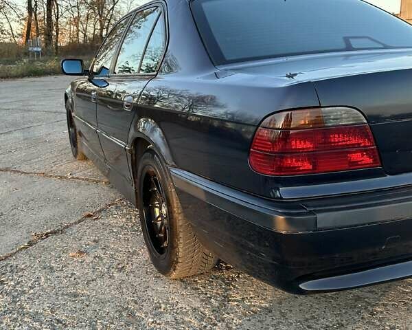 Черный БМВ 7 Серия, объемом двигателя 3 л и пробегом 310 тыс. км за 5000 $, фото 7 на Automoto.ua