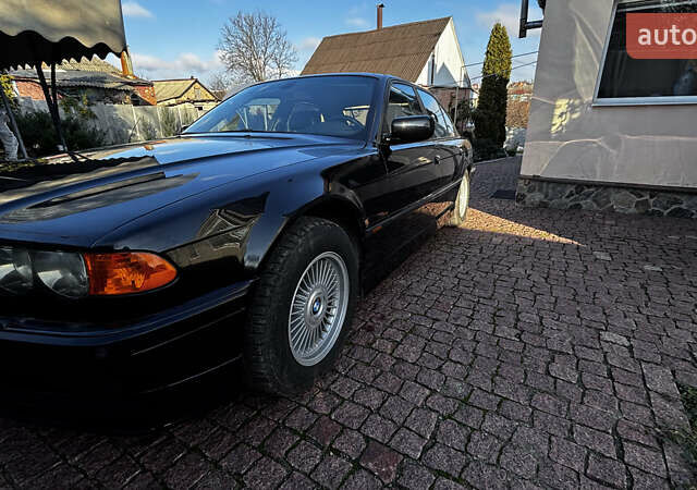 Черный БМВ 7 Серия, объемом двигателя 3.5 л и пробегом 370 тыс. км за 12000 $, фото 8 на Automoto.ua