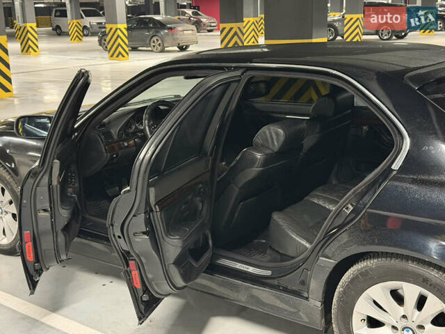 Черный БМВ 7 Серия, объемом двигателя 4.4 л и пробегом 450 тыс. км за 4500 $, фото 19 на Automoto.ua