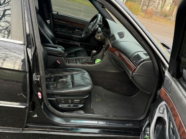 Черный БМВ 7 Серия, объемом двигателя 4.4 л и пробегом 380 тыс. км за 1999 $, фото 16 на Automoto.ua