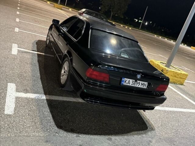 Черный БМВ 7 Серия, объемом двигателя 4.4 л и пробегом 350 тыс. км за 2450 $, фото 9 на Automoto.ua