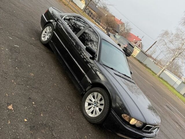 Черный БМВ 7 Серия, объемом двигателя 4.4 л и пробегом 380 тыс. км за 1999 $, фото 8 на Automoto.ua