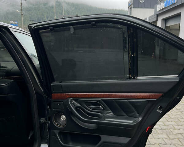 Черный БМВ 7 Серия, объемом двигателя 4.4 л и пробегом 400 тыс. км за 5499 $, фото 17 на Automoto.ua