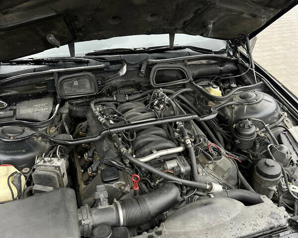 Черный БМВ 7 Серия, объемом двигателя 4.4 л и пробегом 400 тыс. км за 5499 $, фото 19 на Automoto.ua