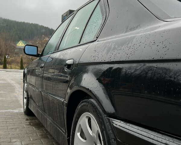 Черный БМВ 7 Серия, объемом двигателя 4.4 л и пробегом 400 тыс. км за 5499 $, фото 6 на Automoto.ua