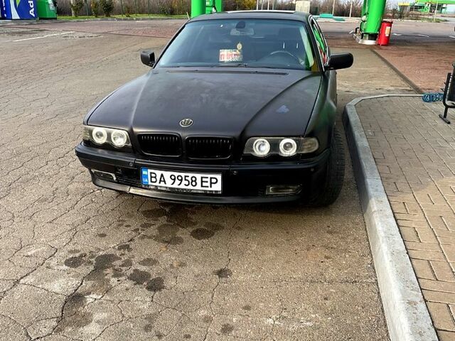 Черный БМВ 7 Серия, объемом двигателя 5.4 л и пробегом 400 тыс. км за 6000 $, фото 1 на Automoto.ua