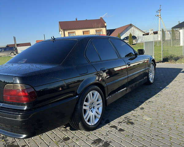 Чорний БМВ 7 Серія, об'ємом двигуна 3.5 л та пробігом 530 тис. км за 7700 $, фото 4 на Automoto.ua