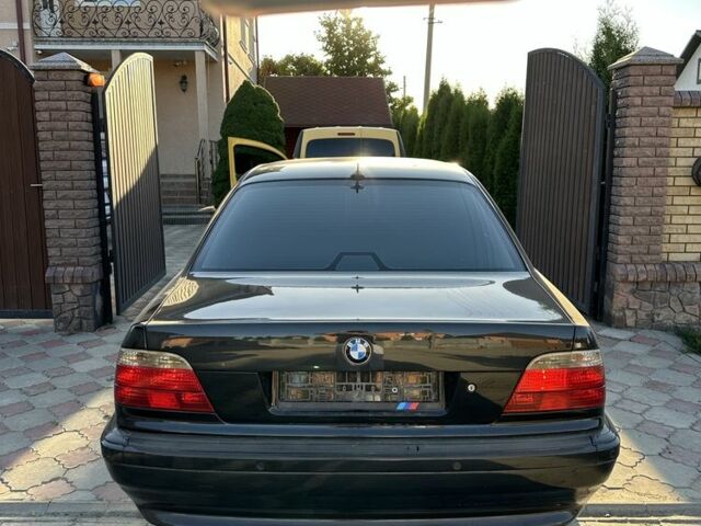 Черный БМВ 7 Серия, объемом двигателя 4.4 л и пробегом 300 тыс. км за 4950 $, фото 2 на Automoto.ua