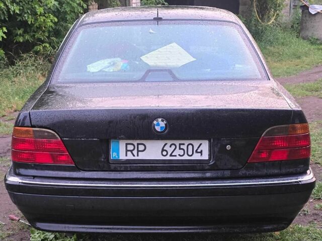 Черный БМВ 7 Серия, объемом двигателя 3 л и пробегом 600 тыс. км за 2999 $, фото 1 на Automoto.ua