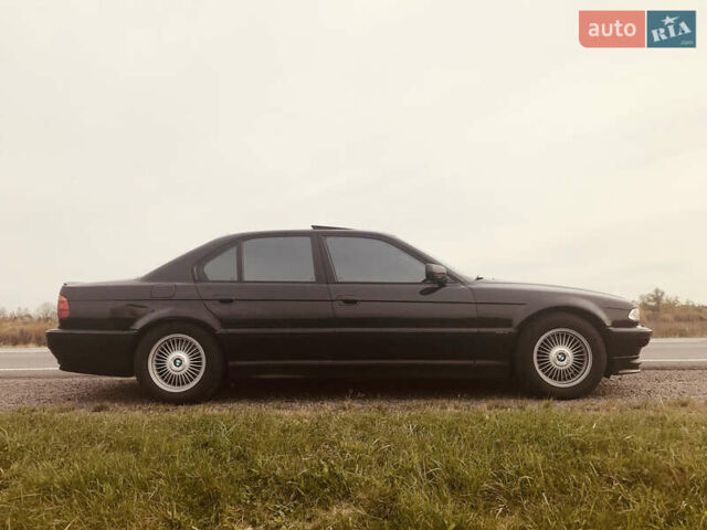 Черный БМВ 7 Серия, объемом двигателя 3.5 л и пробегом 370 тыс. км за 12000 $, фото 2 на Automoto.ua