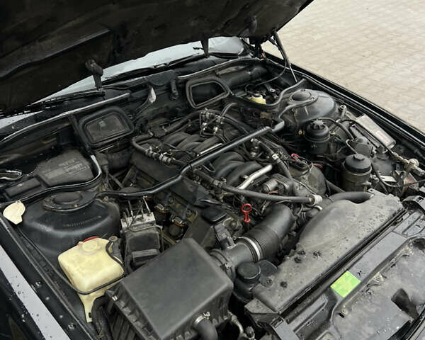 Черный БМВ 7 Серия, объемом двигателя 4.4 л и пробегом 400 тыс. км за 5499 $, фото 20 на Automoto.ua