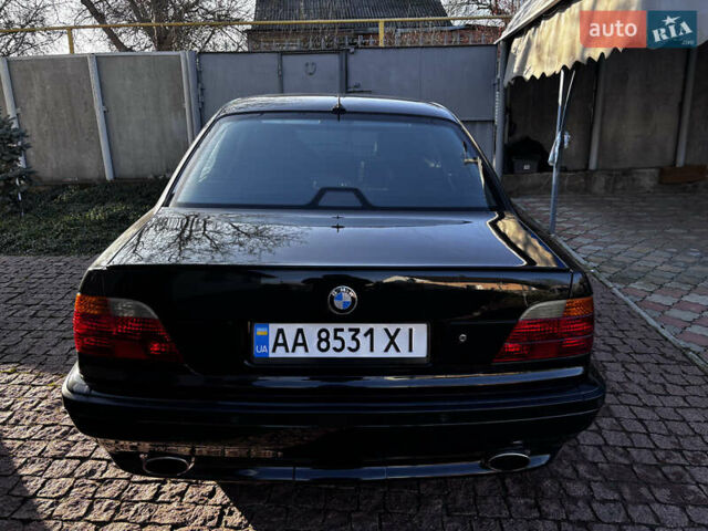 Черный БМВ 7 Серия, объемом двигателя 3.5 л и пробегом 370 тыс. км за 12000 $, фото 5 на Automoto.ua