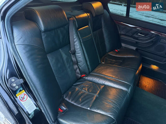 Чорний БМВ 7 Серія, об'ємом двигуна 4.4 л та пробігом 409 тис. км за 9200 $, фото 23 на Automoto.ua