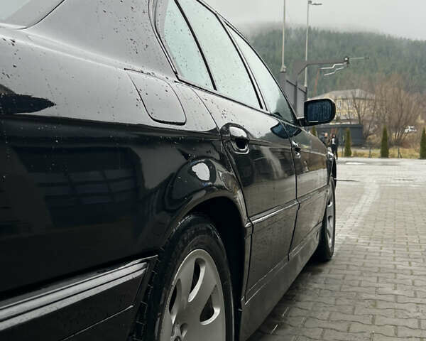 Черный БМВ 7 Серия, объемом двигателя 4.4 л и пробегом 400 тыс. км за 5499 $, фото 7 на Automoto.ua