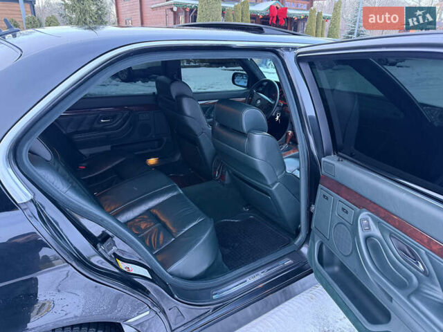 Чорний БМВ 7 Серія, об'ємом двигуна 4.4 л та пробігом 409 тис. км за 9200 $, фото 12 на Automoto.ua