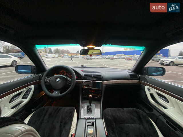 Черный БМВ 7 Серия, объемом двигателя 3.5 л и пробегом 300 тыс. км за 3300 $, фото 11 на Automoto.ua