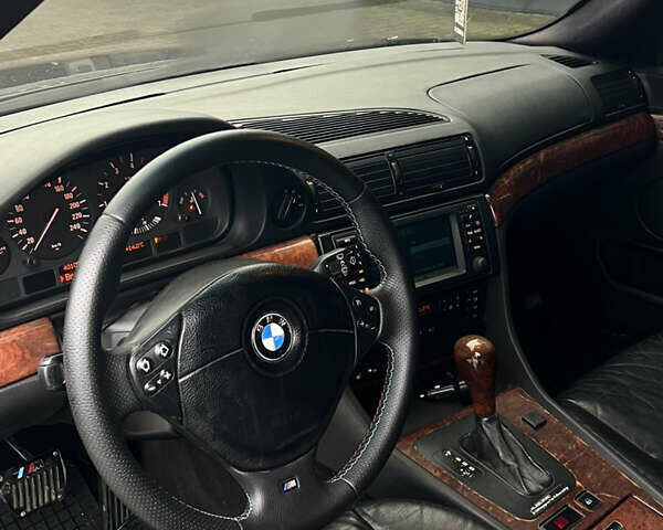 Черный БМВ 7 Серия, объемом двигателя 4.4 л и пробегом 400 тыс. км за 5499 $, фото 9 на Automoto.ua