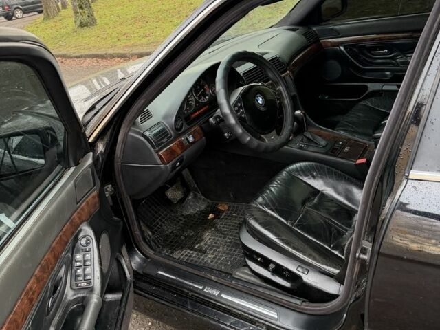 Черный БМВ 7 Серия, объемом двигателя 4.4 л и пробегом 380 тыс. км за 1999 $, фото 13 на Automoto.ua