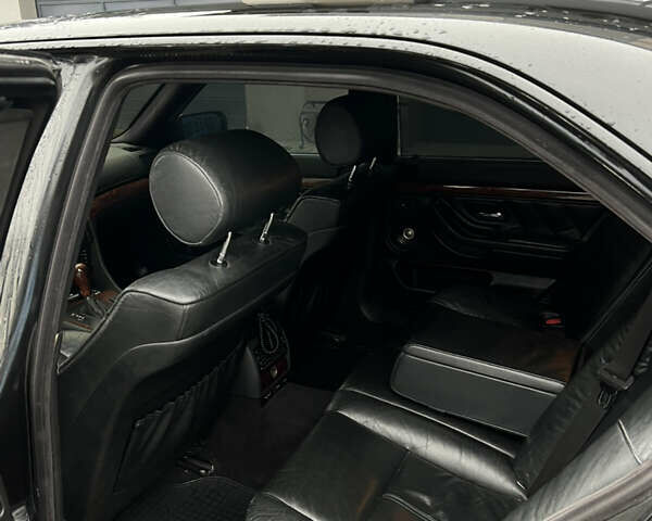 Черный БМВ 7 Серия, объемом двигателя 4.4 л и пробегом 400 тыс. км за 5499 $, фото 13 на Automoto.ua