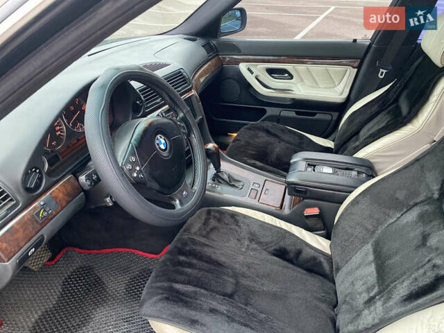 Черный БМВ 7 Серия, объемом двигателя 3.5 л и пробегом 300 тыс. км за 3300 $, фото 13 на Automoto.ua