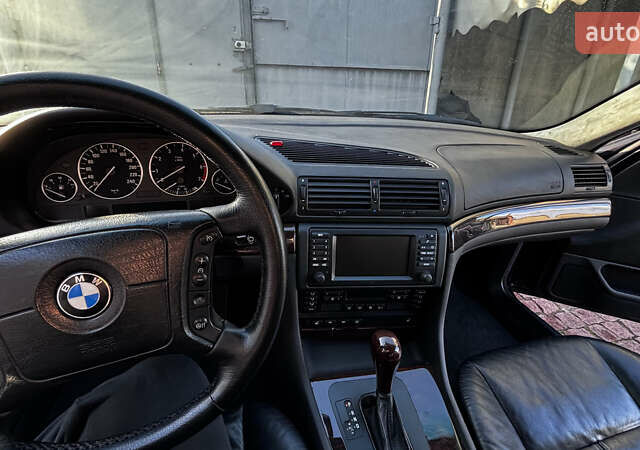 Черный БМВ 7 Серия, объемом двигателя 3.5 л и пробегом 370 тыс. км за 12000 $, фото 12 на Automoto.ua