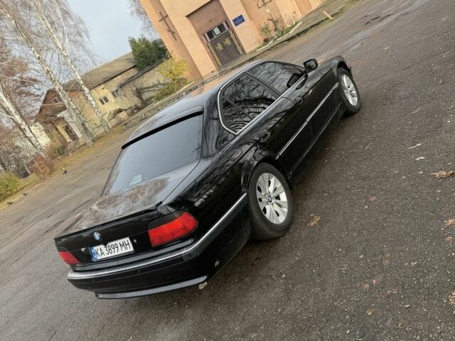 Черный БМВ 7 Серия, объемом двигателя 4.4 л и пробегом 380 тыс. км за 1999 $, фото 9 на Automoto.ua