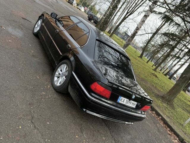 Черный БМВ 7 Серия, объемом двигателя 4.4 л и пробегом 380 тыс. км за 1999 $, фото 11 на Automoto.ua