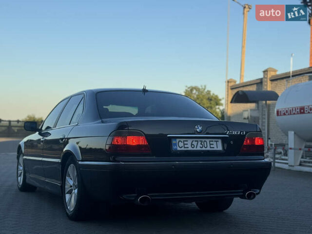Черный БМВ 7 Серия, объемом двигателя 3 л и пробегом 390 тыс. км за 6700 $, фото 2 на Automoto.ua