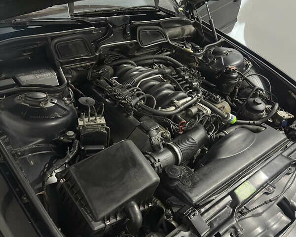 Чорний БМВ 7 Серія, об'ємом двигуна 3.5 л та пробігом 530 тис. км за 7700 $, фото 1 на Automoto.ua