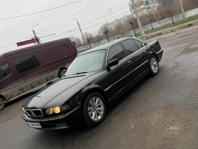 Черный БМВ 7 Серия, объемом двигателя 4.4 л и пробегом 380 тыс. км за 1999 $, фото 3 на Automoto.ua