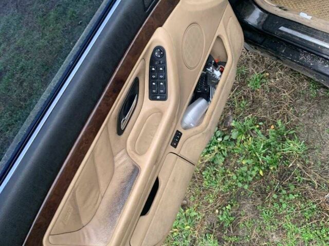 Черный БМВ 7 Серия, объемом двигателя 3.5 л и пробегом 392 тыс. км за 4000 $, фото 1 на Automoto.ua